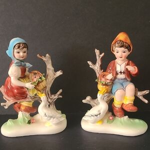 Charming Boy and Girl Figurines with Ducks